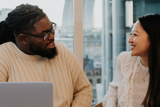 2 people working together 2